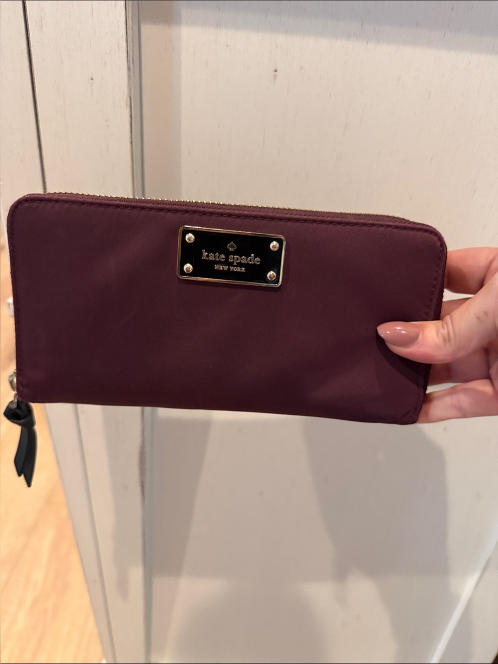 kate spade deep plum zip-around wallet with logo plaque vinyl maroon fall